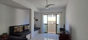 Μια τηλεόραση ή/και κέντρο ψυχαγωγίας στο Apto na Prainha a 4 minutos da Praia