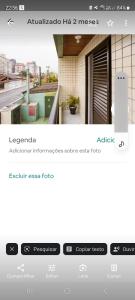 a screenshot of a website of a house at Apartamento Próximo ao Mar in Praia Grande