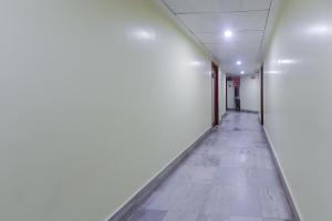 an empty hallway in an office building at Super Collection O Hotel President in Guwahati