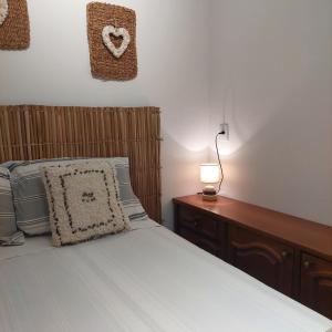 Cama o camas de una habitación en Mala & Tudo Pousada