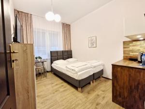 Postel nebo postele na pokoji v ubytování Hostel Helvetia Rooms Warsaw CITY CENTER and OLD TOWN