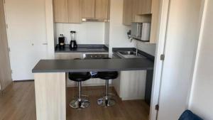 Kuchyň nebo kuchyňský kout v ubytování Departamento Viña del Mar Verano 2026