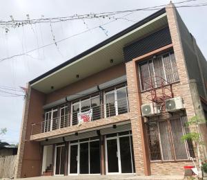 a building with a balcony on top of it at 3MC Guest House in Butuan