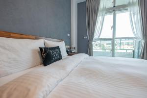 Letto o letti in una camera di Ruisui Style B&B