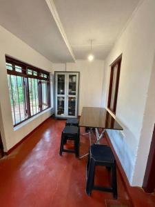 Posezení v ubytování Firefly Cottage Bandarawela