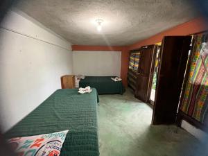CARIBbEAN Paradise Hotel客房内的一张或多张床位