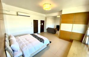 Letto o letti in una camera di Green Field Sweet House