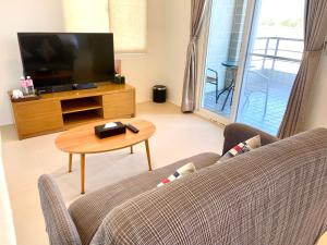 TV o dispositivi per l'intrattenimento presso Green Field Sweet House