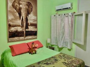 Кровать или кровати в номере Casa-Apt de 2 Dormitorios Perfecta Ubicacion