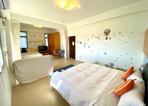 Letto o letti in una camera di Green Field Sweet House