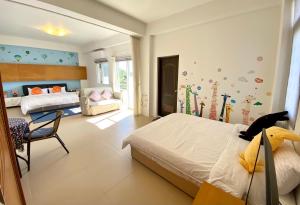 Letto o letti in una camera di Green Field Sweet House