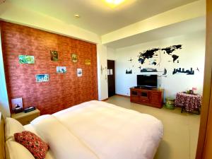 Letto o letti in una camera di Green Field Sweet House