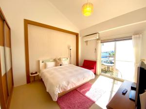 Letto o letti in una camera di Green Field Sweet House