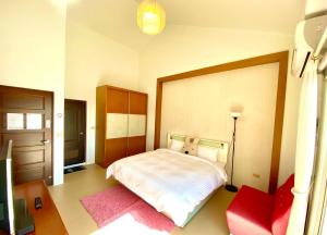 Letto o letti in una camera di Green Field Sweet House