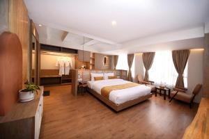 Postel nebo postele na pokoji v ubytování Daali Hotel & Apartment