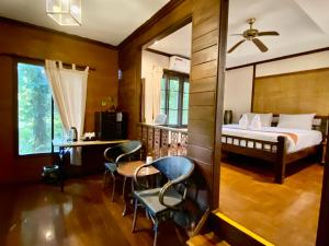 Postel nebo postele na pokoji v ubytování Fern Resort Mae Hong Son + 37 fotografií
