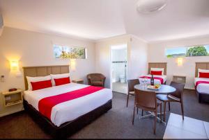 Katil atau katil-katil dalam bilik di Apple & Grape Motel