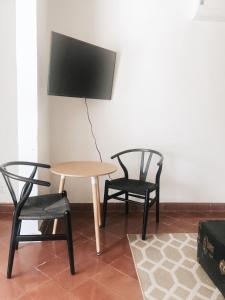 TV a/nebo společenská místnost v ubytování Hotel Boutique KAA