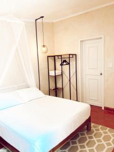 Postel nebo postele na pokoji v ubytování Hotel Boutique KAA