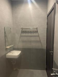 Kylpyhuone majoituspaikassa Homestay Bối Bối