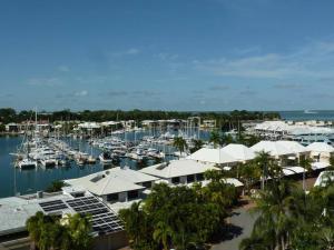 a marina with boats in the water and buildings at Spectacular Marina Views Apartment in Larrakeyah