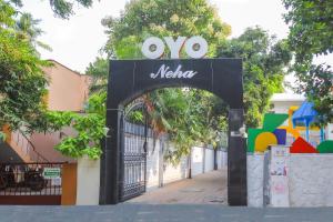 an entrance to a mexico sign in front of a building at Pride Hospitality Nungambakkam in Chennai