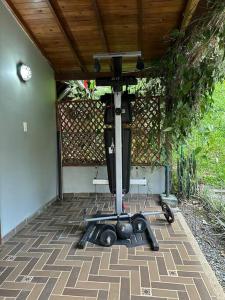 a machine sitting on the ground in a patio at Cabaña sendero verde in Envigado