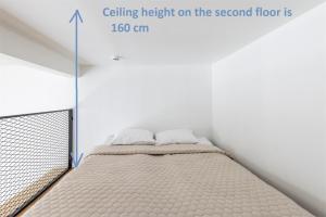 Postel nebo postele na pokoji v ubytování Two-level Loft Apartments in Swedish style 7