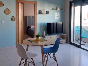 TV a/nebo společenská místnost v ubytování top apartment Airport Mohamed 5