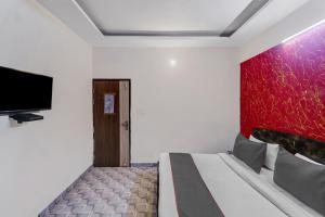 TV a/nebo společenská místnost v ubytování Hotel O One Plus One Residency