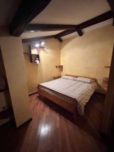 Postel nebo postele na pokoji v ubytování B&B Borgata 2000