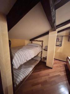 Postel nebo postele na pokoji v ubytování B&B Borgata 2000