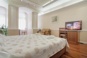 TV a/nebo společenská místnost v ubytování Consul Hotel Консул + 37 fotografií
