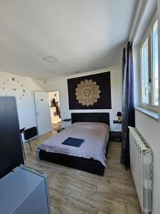 a bedroom with a large bed in a room at wanderlust in Pomezia