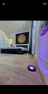 a bedroom with a bed and a frisbee on the floor at wanderlust in Pomezia
