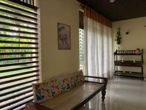 Χώρος καθιστικού στο Serene Garden Lodge