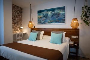 Cama o camas de una habitación en Hostal Boutique Casa del Mar Altea
