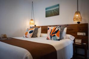 Cama o camas de una habitación en Hostal Boutique Casa del Mar Altea