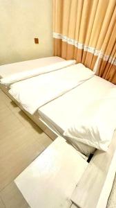 Ένα ή περισσότερα κρεβάτια σε δωμάτιο στο Villa Vista Lago +2 φωτογραφίες