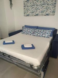Łóżko lub łóżka w pokoju w obiekcie Duplex RiAnna