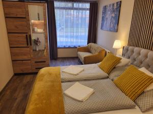 Posedenie v ubytovaní Glória Apartman Szarvas