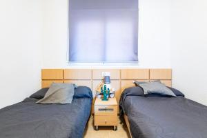 Posteľ alebo postele v izbe v ubytovaní Apartamento MAGIC WORLD nueva Marina D`or 2 dormitorios Edificio Torremar