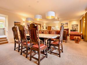 a dining room with a table and chairs at 4 Bed in Matterdale SZ367 in Dockray