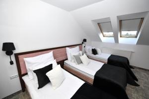 Posteľ alebo postele v izbe v ubytovaní Hotel Focus Centrum Konferencyjne