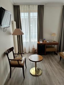 Posezení v ubytování Hôtel des Alpes