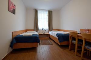 Postel nebo postele na pokoji v ubytování Hotel Miramar