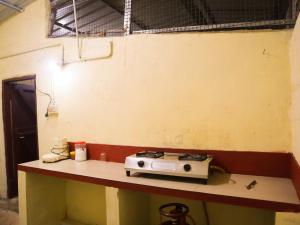 ムンナルにあるMunnar Valley Viewのキッチン(コンロ付) +17枚の写真