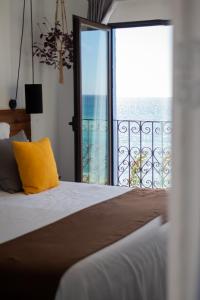 Cama o camas de una habitación en Hostal Boutique Casa del Mar Altea