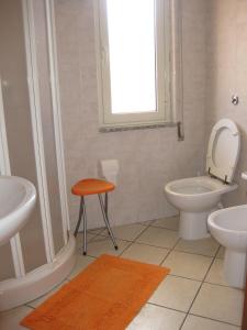 Koupelna v ubytování Appartamento elegante e confortevole + 12 fotografií