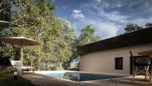 a swimming pool next to a house with an umbrella at LU DA kuca in Sveti Ivan Zelina